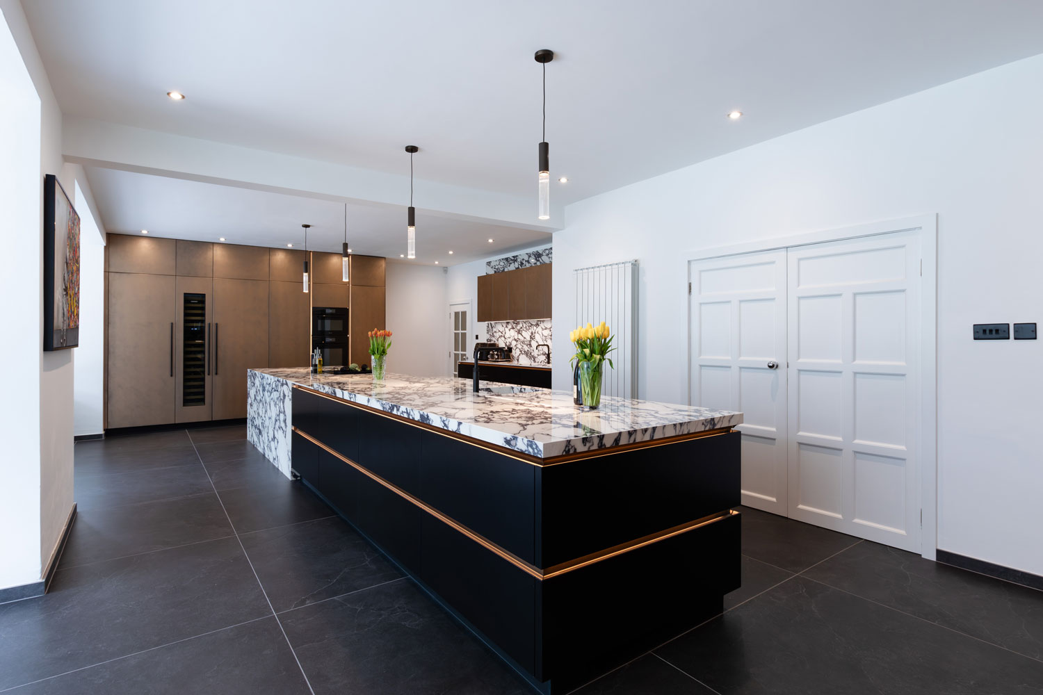 Luxury kitchen with free-standing kitchen island, ceiling-high kitchen cabinets