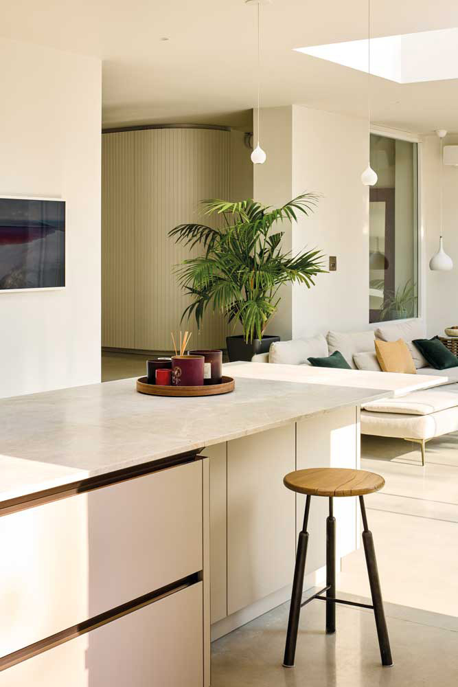 i-luminate designer kitchen with kitchen island and bar stool