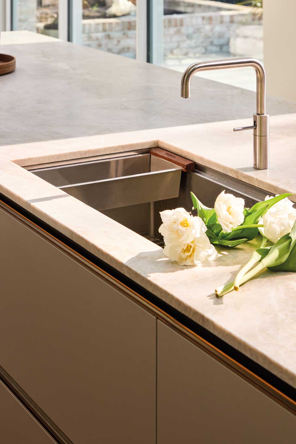i-luminate designer kitchen with sink and tap